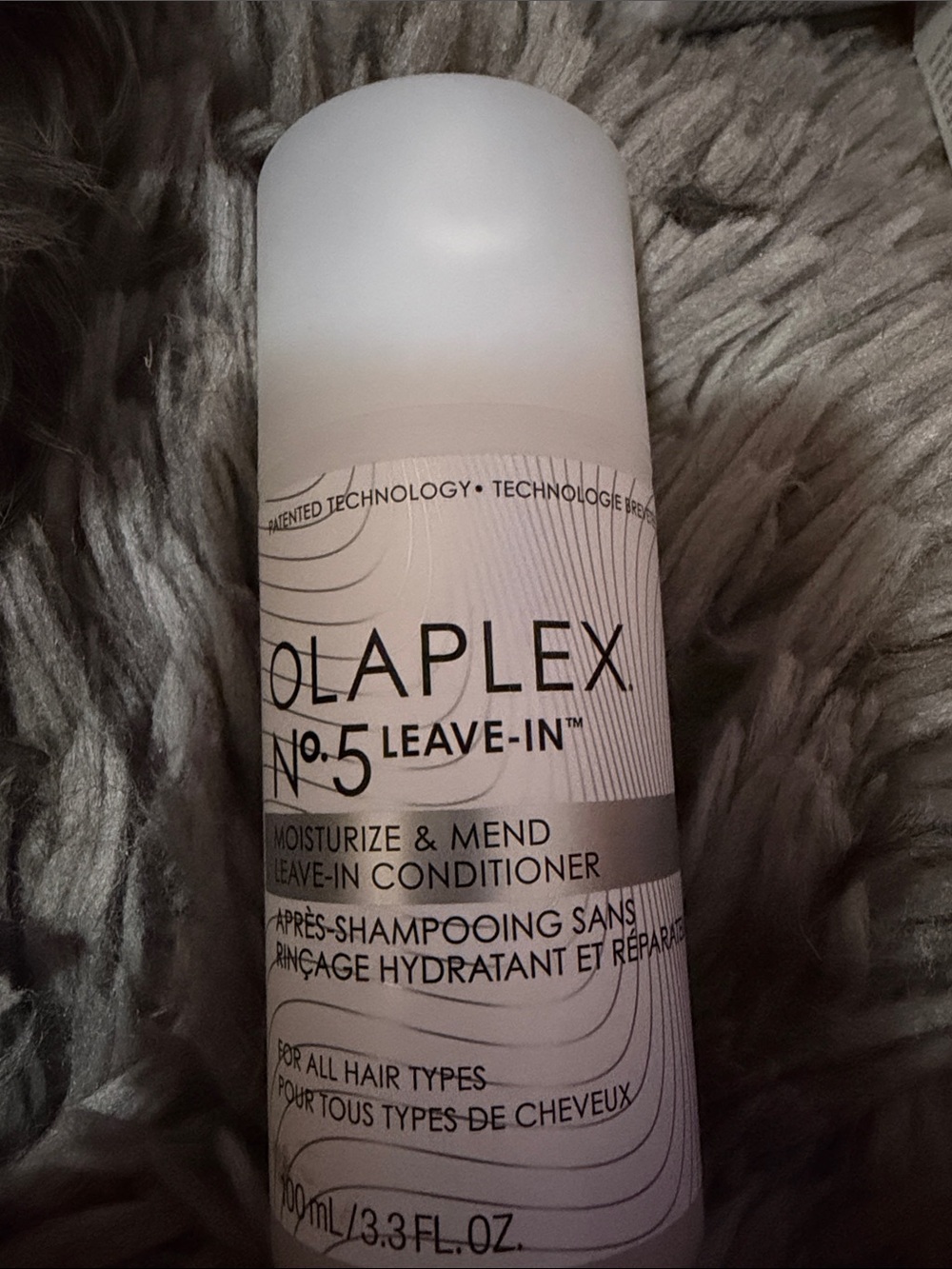 OLAPLEX No.5 Leave-In Conditioner — white and black bottle